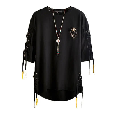 Black lace-up gothic streetwear T-shirt with patchwork design on hanger