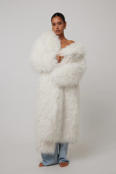 Elegant long white faux fur coat for women – full-length winter outerwear with pockets