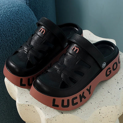 Black and pink women’s thick-soled summer sandals with “LUCKY” lettering, breathable cut-out design, non-slip sole – casual beach and street shoes