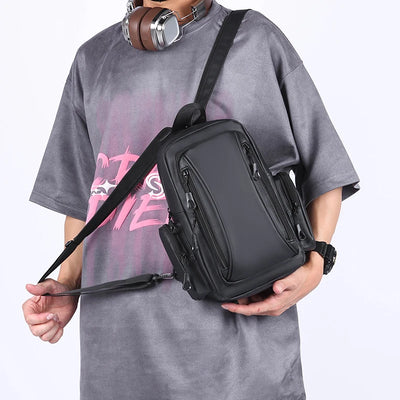 Men’s mini waterproof Oxford backpack in black with multi-pocket design for travel, school, and casual wear