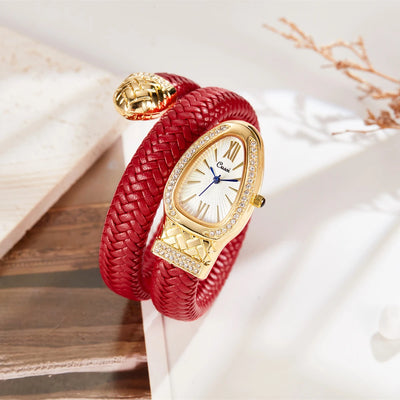 Women’s gold snake bracelet watch with diamond bezel and red braided leather strap