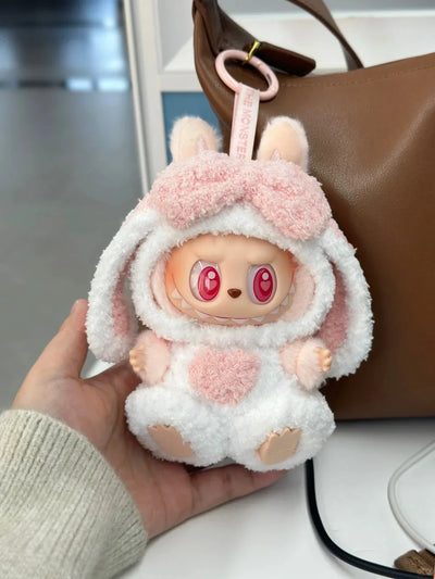 Labubu 17cm doll wearing fluffy rabbit costume with long ears and pink heart detail