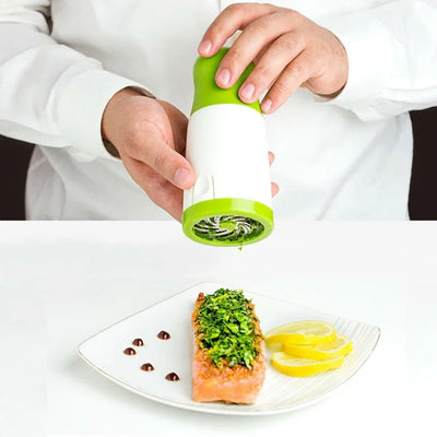 Manual herb grinder and spice mill shredding parsley on a cutting board